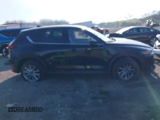 2019 Mazda CX-5 Grand Touring with VIN JM3KFBDM7K0525650, listed as a IAAI auction lot 42032757 with 65,530 mi miles and . Bid and sale history available at DreamBid. Image 14.