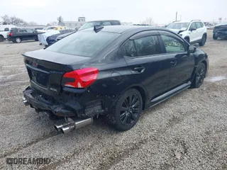 2015 Subaru WRX Limited with VIN JF1VA1J60F9825803, listed as a IAAI auction lot 41692207 with 115,401 mi miles. Bid and sale history available at carsss.com. Image 4.