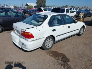 2000 Honda Civic LX with VIN 2HGEJ6673YH502410, listed as a IAAI auction lot 41992745 with 173,958 mi miles. Bid and sale history available at carsss.com. Image 4.