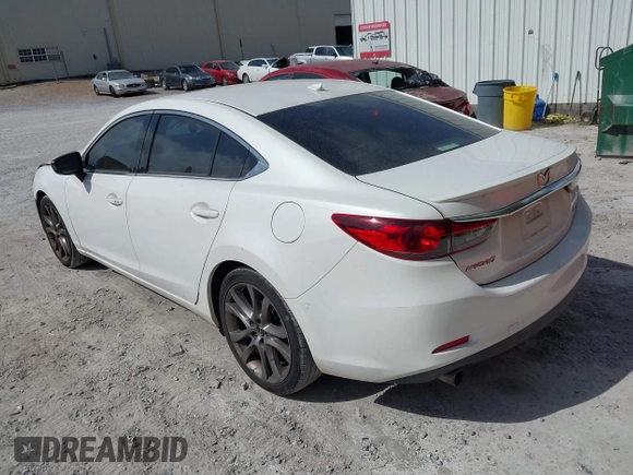 2015 Mazda 6 i Grand Touring with VIN JM1GJ1W50F1204322, listed as a IAAI auction lot 40694216 with 141,357 mi miles. Bid and sale history available at carsss.com. Image 3.