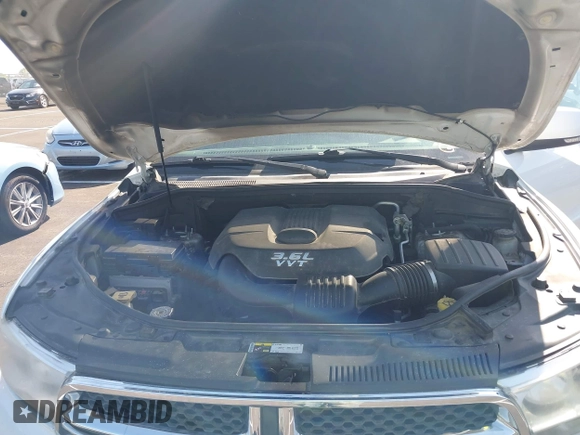 2013 Dodge Durango Crew with VIN 1C4RDJDG0DC670810, listed as a IAAI auction lot 41974024 with 209,379 mi miles and . Bid and sale history available at DreamBid. Image 10.