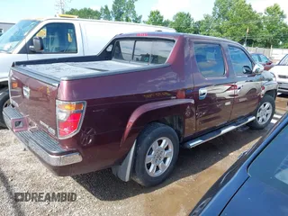 2007 Honda Ridgeline RTL with VIN 2HJYK16587H518901, listed as a IAAI auction lot 42762425 with 206,243 mi miles and . Bid and sale history available at DreamBid. Image 4.