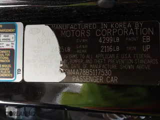 2011 Kia Optima LX with VIN KNAGM4A78B5117530, listed as a IAAI auction lot 42047302 with 171,168 mi miles. Bid and sale history available at carsss.com. Image 9.