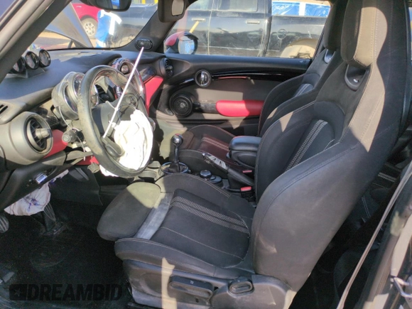 2016 MINI Hardtop John Cooper Works with VIN WMWXM9C50GT997764, listed as a Copart auction lot 52826365 with 82,430 mi miles and Salvage title. Bid and sale history available at DreamBid. Image 7.