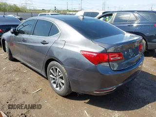 2020 Acura TLX w/Technology Pkg with VIN 19UUB1F52LA012185, listed as a IAAI auction lot 41942957 with 14,677 mi miles. Bid and sale history available at carsss.com. Image 3.