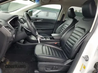 2020 Ford Edge SEL z VIN 2FMPK3J90LBB01559, wystawiony jako Copart lot #61365305 z przebiegiem 120 050 mil mil oraz Czysty tytuł • Clean title. Historia ofert i sprzedaży dostępna na DreamBid. Obrazek 7.