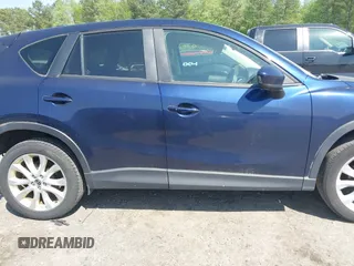 2014 Mazda CX-5 Grand Touring with VIN JM3KE4DYXE0342720, listed as a IAAI auction lot 42026388 with 114,072 mi miles and . Bid and sale history available at carsss.com. Image 14.
