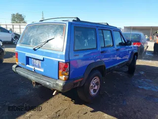 1996 Jeep Cherokee Sport with VIN 1J4FJ68S6TL171428, listed as a IAAI auction lot 40881632 with 323,289 mi miles. Bid and sale history available at carsss.com. Image 4.