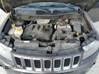 2016 Jeep Compass Sport SE with VIN 1C4NJDBBXGD523537, listed as a Copart auction lot 87664995 with 132,010 mi miles and Salvage title. Bid and sale history available at DreamBid. Image 12.