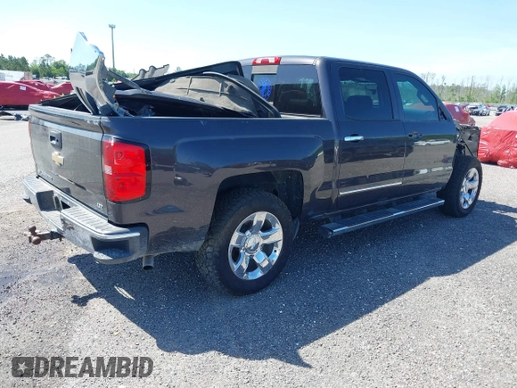 2014 Chevrolet Silverado 1500 LTZ with VIN 3GCUKSEC8EG536076, listed as a IAAI auction lot 41464408 with 133,418 mi miles and . Bid and sale history available at DreamBid. Image 4.