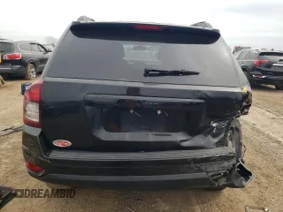 2014 Jeep Compass Altitude with VIN 1C4NJCBA8ED730183, listed as a Copart auction lot 73128034 with 76,993 mi miles and Salvage Title. Bid and sale history available at carsss.com. Image 6.