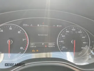 2014 Audi A7 Premium Plus z VIN WAUWGAFCXEN037853, wystawiony jako Copart lot #54741855 z przebiegiem 162 927 mil mil oraz Szkoda całkowita • Salvage title. Historia ofert i sprzedaży dostępna na DreamBid. Obrazek 9.