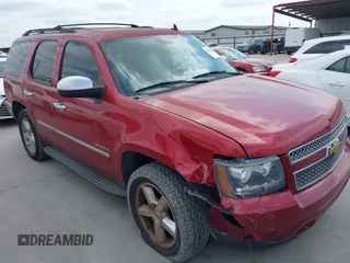 2014 Chevrolet Tahoe LTZ with VIN 1GNSCCE02ER160059, listed as a IAAI auction lot 42039322 with 135,534 mi miles and . Bid and sale history available at DreamBid. Image 1.