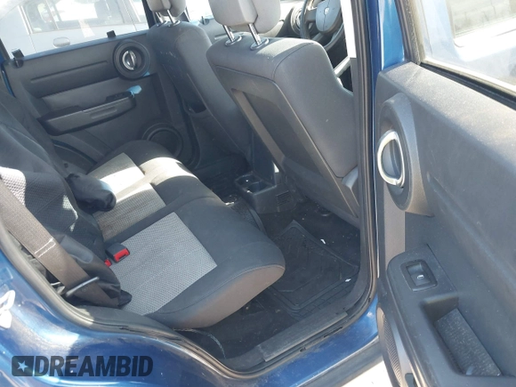 2010 Dodge Nitro SE with VIN 1D4PT2GK4AW141616, listed as a IAAI auction lot 42183953 with 128,023 mi miles. Bid and sale history available at carsss.com. Image 8.