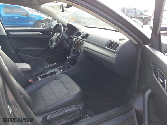 2014 Volkswagen Passat SE w/Sunroof with VIN 1VWBT7A34EC118525, listed as a IAAI auction lot 41653118 with 124,832 mi miles. Bid and sale history available at carsss.com. Image 5.