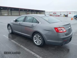 2013 Ford Taurus Limited with VIN 1FAHP2F81DG206437, listed as a IAAI auction lot 41942116 with 194,336 mi miles. Bid and sale history available at carsss.com. Image 3.