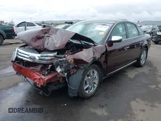 2009 Ford Taurus Limited z VIN 1FAHP25W59G115291, wystawiony jako IAAI lot #42195549 z przebiegiem 58 983 mil mil oraz . Historia ofert i sprzedaży dostępna na DreamBid. Obrazek 2.