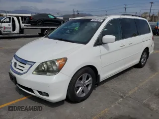 2010 Honda Odyssey Touring с VIN 5FNRL3H94AB068484, выставлен на аукционе Copart как лот 56819895 с пробегом 128 260 миль миль и Списание • Salvage title. История ставок и продаж доступна на DreamBid. Изображение 1.