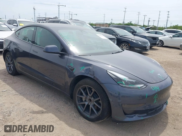 2023 Tesla Model 3 with VIN 5YJ3E1EA5PF565071, listed as a IAAI auction lot 42232719 with 15,389 mi miles and . Bid and sale history available at DreamBid. Image 1.