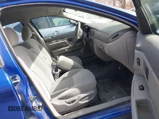 2003 Ford Taurus SE Standard with VIN 1FAFP53233G208763, listed as a IAAI auction lot 41661923 with 127,830 mi miles. Bid and sale history available at carsss.com. Image 5.