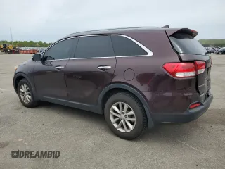 2016 Kia Sorento LX z VIN 5XYPG4A39GG061412, wystawiony jako Copart lot #57947885 z przebiegiem 134 381 mil mil oraz Szkoda całkowita • Salvage title. Historia ofert i sprzedaży dostępna na DreamBid. Obrazek 2.