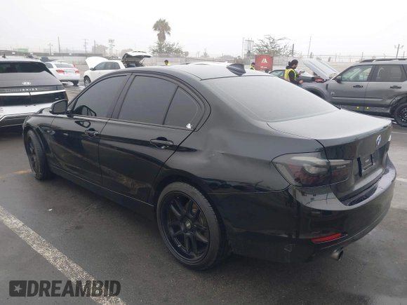 2014 BMW 3 Series 320i with VIN WBA3B1C59EK130839, listed as a IAAI auction lot 41225364 with 131,312 mi miles. Bid and sale history available at carsss.com. Image 3.
