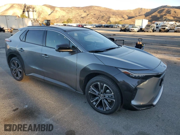 2023 Toyota bZ4X XLE with VIN JTMAAAAAXPA019772, listed as a Copart auction lot 85053124 with 9,591 mi miles and Salvage Title. Bid and sale history available at DreamBid. Image 4.