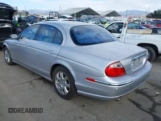 2003 Jaguar S-Type with VIN SAJEA01T83FM48713, listed as a IAAI auction lot 41402152 with 142,875 mi miles and . Bid and sale history available at DreamBid. Image 3.