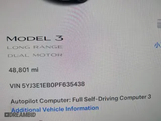 2023 Tesla Model 3 Long Range with VIN 5YJ3E1EB0PF635438, listed as a IAAI auction lot 41630945 with 48,801 mi miles. Bid and sale history available at carsss.com. Image 7.