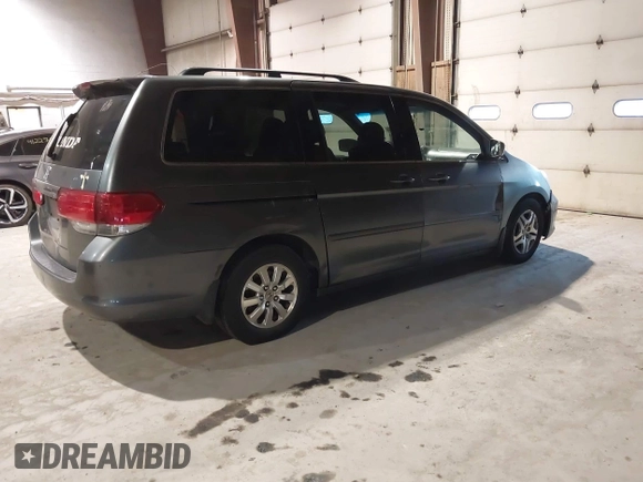 2010 Honda Odyssey EX-L with VIN 5FNRL3H78AB030111, listed as a IAAI auction lot 41250121 with 333,030 mi miles and . Bid and sale history available at DreamBid. Image 4.