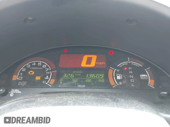 2004 Honda Insight z VIN JHMZE14744T000527, wystawiony jako IAAI lot #42378630 z przebiegiem 1 360 mil mil oraz . Historia ofert i sprzedaży dostępna na DreamBid. Obrazek 7.