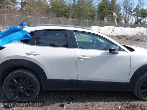 2022 Mazda CX-30 2.5 Turbo with VIN 3MVDMBAY7NM443187, listed as a IAAI auction lot 41771395 with 39,475 mi miles and . Bid and sale history available at DreamBid. Image 13.
