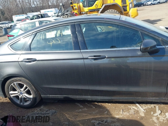 2018 Ford Fusion SE z VIN 3FA6P0HD7JR211569, wystawiony jako IAAI lot #41792146 z przebiegiem 187 505 mil mil oraz . Historia ofert i sprzedaży dostępna na DreamBid. Obrazek 13.
