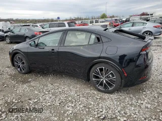 2024 Toyota Prius LE z VIN JTDACAAU3R3038322, wystawiony jako Copart lot #51369275 z przebiegiem 5 292 mil mil oraz Szkoda całkowita • Salvage title. Historia ofert i sprzedaży dostępna na DreamBid. Obrazek 2.