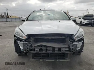 2017 Ford Focus SE with VIN 1FADP3F27HL217567, listed as a Copart auction lot 53749175 with 62,727 mi miles and Salvage title. Bid and sale history available at DreamBid. Image 5.