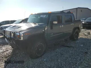 2005 Hummer H2 SUT z VIN 5GRGN22U05H117984, wystawiony jako Copart lot #52432685 z przebiegiem 169 056 mil mil oraz Czysty tytuł • Clean title. Historia ofert i sprzedaży dostępna na DreamBid. Obrazek 1.