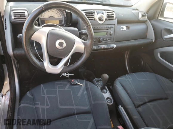 2010 Smart fortwo Pure with VIN WMEEJ3BA4AK363015, listed as a Copart auction lot 48892365 with 70,766 mi miles and Salvage title. Bid and sale history available at DreamBid. Image 8.