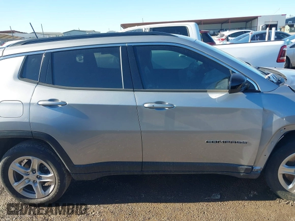 2023 Jeep Compass Latitude with VIN 3C4NJDBN5PT540587, listed as a IAAI auction lot 41214077 with 35,887 mi miles and . Bid and sale history available at DreamBid. Image 14.