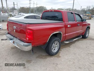 2006 Dodge Dakota SLT with VIN 1D7HE48K26S511004, listed as a IAAI auction lot 41344188 with 208,273 mi miles and . Bid and sale history available at DreamBid. Image 4.