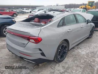 2022 Kia K5 GT-Line z VIN 5XXG64J24NG124900, wystawiony jako IAAI lot #41547846 z przebiegiem 104 024 mil mil oraz . Historia ofert i sprzedaży dostępna na DreamBid. Obrazek 4.