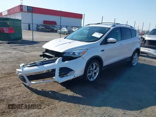 2013 Ford Escape Titanium with VIN 1FMCU0J97DUA70393, listed as a IAAI auction lot 41974106 with 73,548 mi miles and . Bid and sale history available at carsss.com. Image 18.