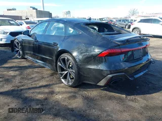 2021 Audi RS 7 z VIN WUAPCBF23MN903930, wystawiony jako IAAI lot #41669778 z przebiegiem 13 175 mil mil oraz . Historia ofert i sprzedaży dostępna na DreamBid. Obrazek 3.