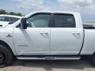 2022 Ram 2500 Big Horn with VIN 3C6UR5DLXNG436311, listed as a IAAI auction lot 42474145 with 59,174 mi miles and . Bid and sale history available at DreamBid. Image 14.
