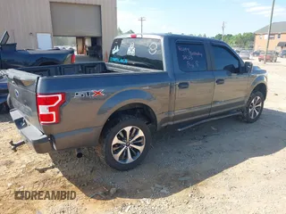 2019 Ford F-150 XL with VIN 1FTEW1C50KKE12234, listed as a IAAI auction lot 42197824 with 130,738 mi miles and . Bid and sale history available at DreamBid. Image 4.