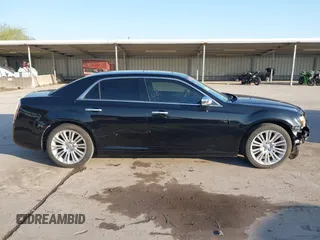2011 Chrysler 300 with VIN 2C3CA6CT8BH595198, listed as a IAAI auction lot 41983417 with 182,067 mi miles. Bid and sale history available at carsss.com. Image 14.
