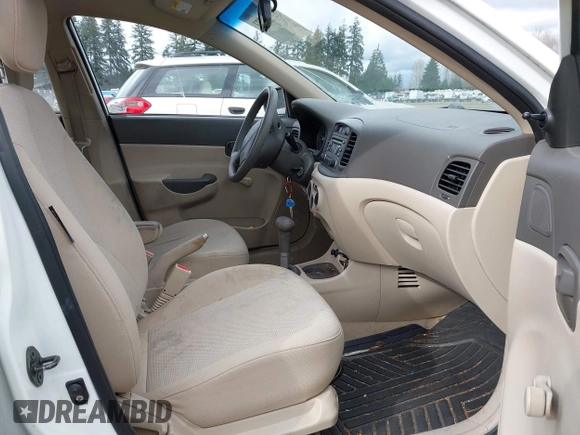 2007 Hyundai Accent GLS with VIN KMHCN46C67U097159, listed as a IAAI auction lot 41913373 with 103,303 mi miles. Bid and sale history available at carsss.com. Image 5.