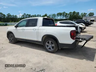 2021 Honda Ridgeline RTL-E with VIN 5FPYK3F71MB021439, listed as a Copart auction lot 67190935 with Not provided miles and Clean title. Bid and sale history available at DreamBid. Image 2.