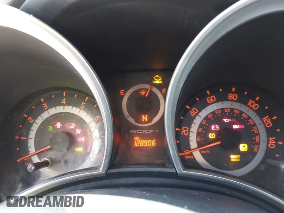 2015 Scion tC with VIN JTKJF5C79FJ003404, listed as a IAAI auction lot 41756024 with 128,906 mi miles. Bid and sale history available at carsss.com. Image 7.