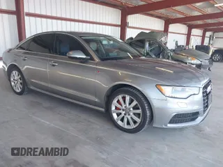 2012 Audi A6 3.0T Prestige with VIN WAUHGAFC6CN080091, listed as a IAAI auction lot 41964023 with 166,334 mi miles. Bid and sale history available at carsss.com. Image 1.