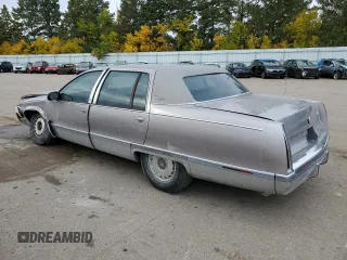 1996 Cadillac Fleetwood z VIN 1G6DW52P6TR702611, wystawiony jako Copart lot #77202664 z przebiegiem 159 994 mil mil oraz Szkody całkowita. Historia ofert i sprzedaży dostępna na DreamBid. Obrazek 2.